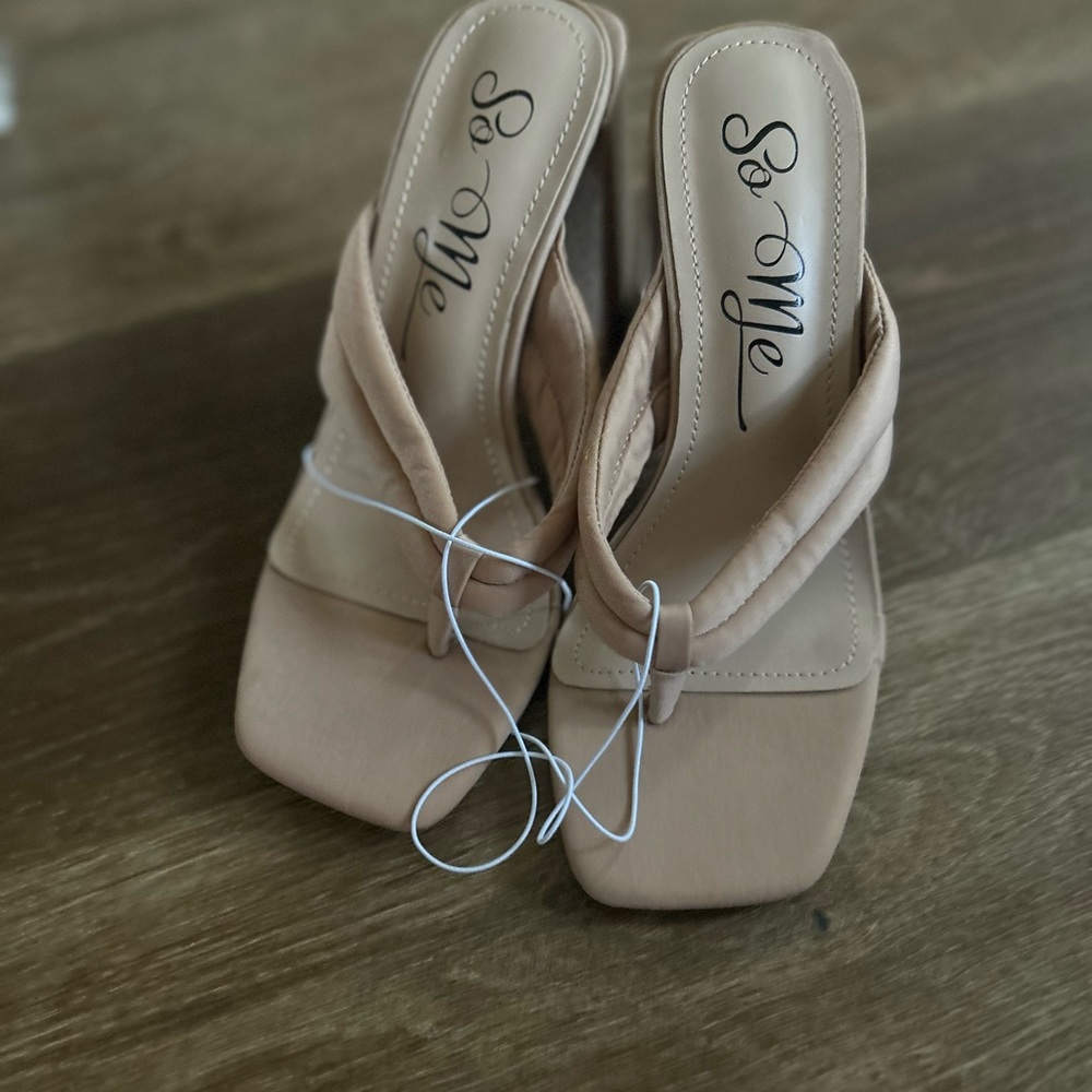 Brand new cute Nude Wedge heels! Never worn. Was giving as a gift.